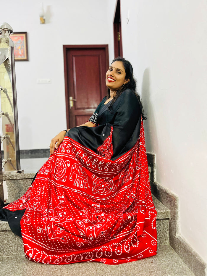 Customer wearing Moss Bandhani Saree with Mirror Work - Black with multi color
